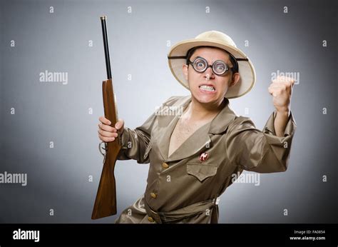 Funny hunter in hunting concept Stock Photo - Alamy