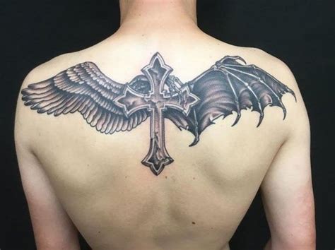 cross-in-the-middle-angel-wing-devil-wing-on-both-sides-angel-tattoos ...