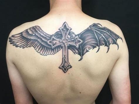 cross-in-the-middle-angel-wing-devil-wing-on-both-sides-angel-tattoos-for-men-black-background ...