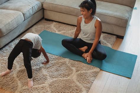 mother and child doing yoga together
