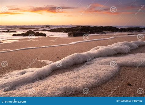 sea foam  beach  sunset  angle close  stock photo image