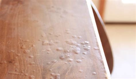 how to fix water damaged wood furniture
