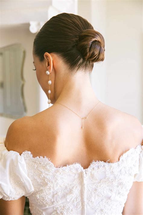 Brides love half updo hairstyles for their elegant yet casual look 1