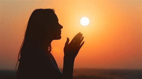 Premium Photo | Silhouette of woman praying with god