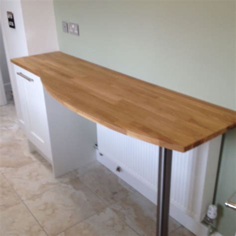 Oak breakfast bar introducing a nice way to bring seating into your #