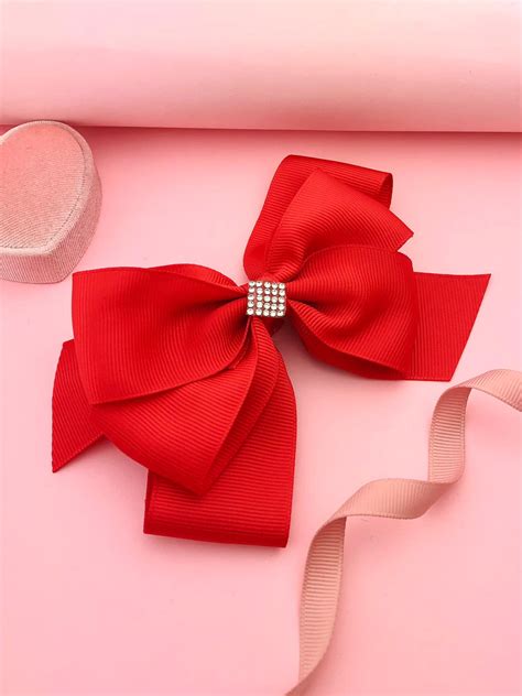 Spinka czerwona kokardka z cyrkoniami - Coralove