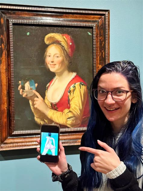 “Smiling Young Woman, a Courtesan, Holding an Obscene Image, 1625