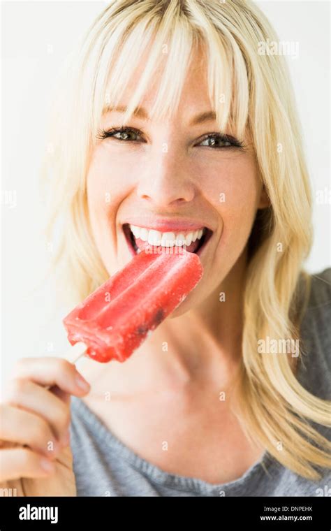 Eating popsicle adult hi-res stock photography and images - Alamy