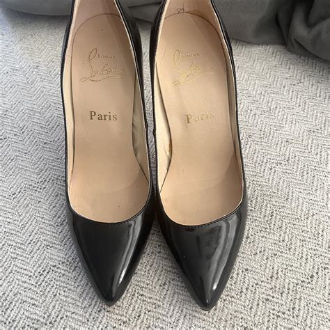 Black Christian Louboutin heels. Shoes show small... - Depop