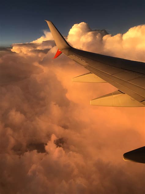 images air travel cloud daytime airline wing atmosphere