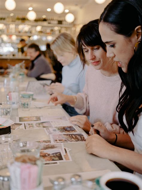 Bride and Her Florist Planning Wedding Flowers at NYC Restaurant