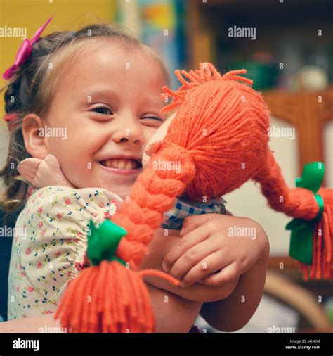 girls with doll Stock Photo - Alamy