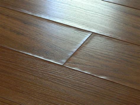 how to fix pergo flooring buckling