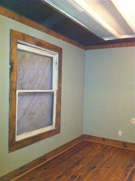 Barn wood trimmed window. Barn tin on ceiling. Baseboard Styles ...