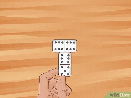 how to play dominoes 4 players
