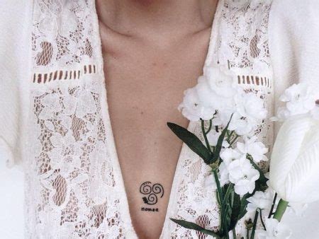 Sternum Tattoo Ideas That Will Make You Want A Tattoo Between Your Breasts