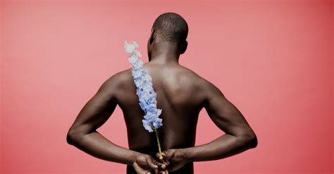 studio shot  shirtless man  flower  stock video footage
