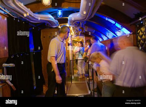 Tourists walking through the U 505 submarine exhibit at the Museum of ...