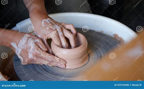 hand making clay pottery  throwing wheel stock photo image
