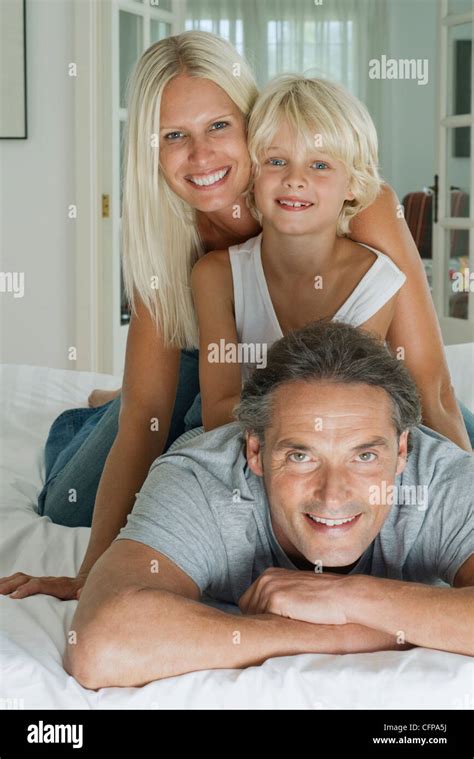 Family with one child, portrait Stock Photo - Alamy