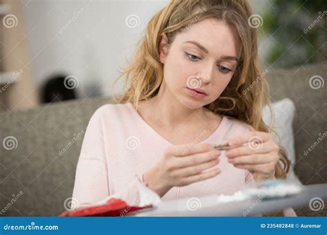 Young Woman during Cigarette Roll-up Stock Photo - Image of girl ...