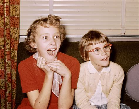My aunt and my mom being told that my grandma was pregnant (1955) : r/Mom