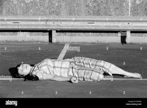 Playing dead woman hi-res stock photography and images - Alamy