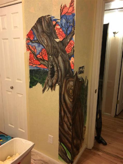 Kitten Finds Hidden Mural Under Wallpaper - The Dodo