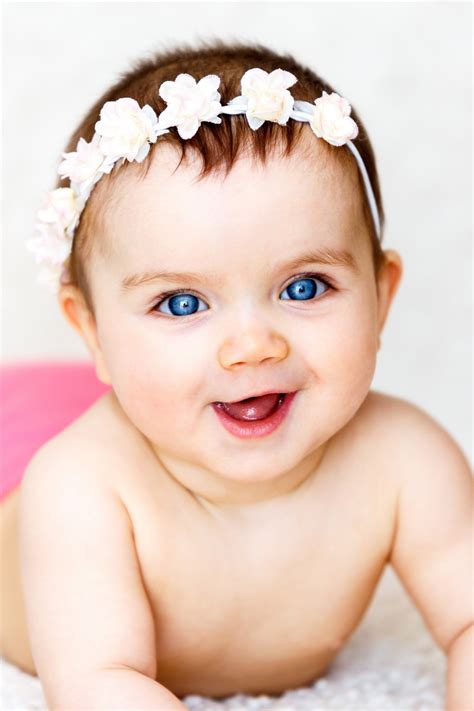 bildet pike portrett barn klaer ore rosa baby hodeplagg
