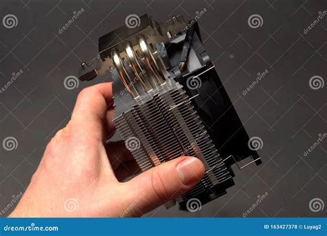 CPU Cooling System. Cooler with a Radiator in the Hands of Man Stock ...