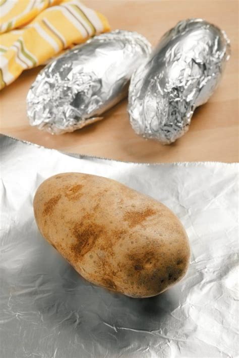 Baked Potatoes in Foil - Prepared Food Photos, Inc.