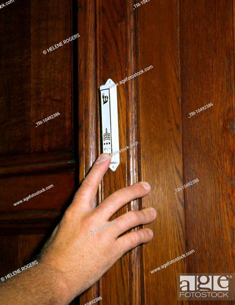 Touching Mezuzah On Door, Stock Photo, Picture And Rights Managed Image ...