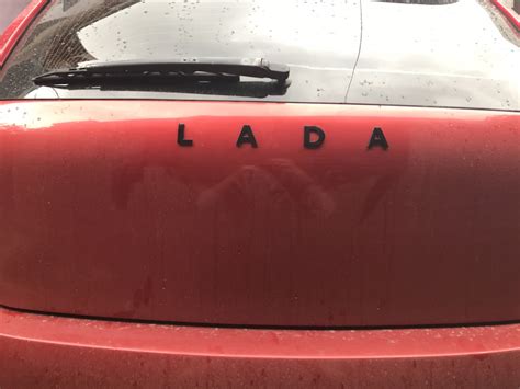 Шильдик лада черный — Lada Калина Спорт (1G), 1,6 л, 2011 года ...