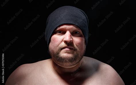 portrait  fat man  cap  nude shoulders stock photo adobe stock
