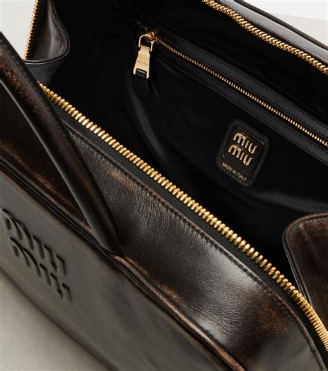 beau leather tote bag  brown miu miu mytheresa