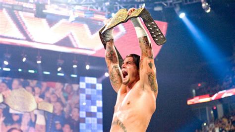 WATCH: CM Punk’s First ever Title Win in WWE - EssentiallySports