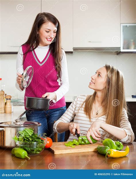 Happy Ordinary Women Cooking Food Stock Image - Image of smiling