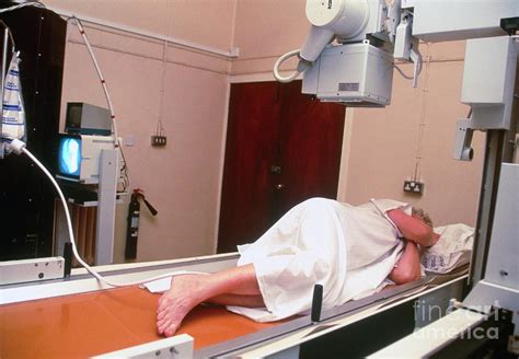 Woman Undergoing A Barium Enema X-ray Examination Photograph by Antonia ...