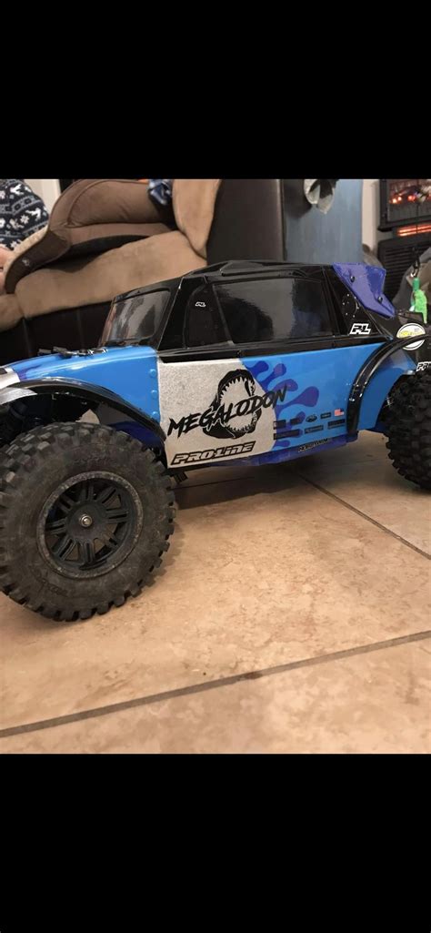 Is this worth the trade my arrma senton 3s or his 2wd traxxas slash 3s ...