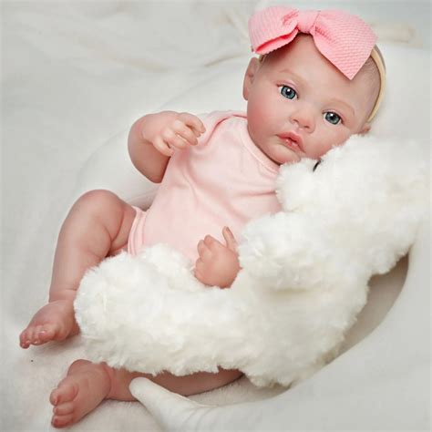 Bebê Reborn Rosa - Boneca Bebê Reborn realista com macacão rosa Brastoy - Importados Lili
