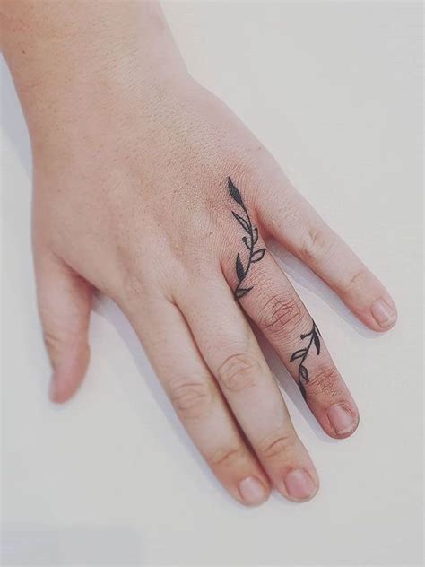 Simple and tiny finger tattoos for women, include heart designs, floral ...