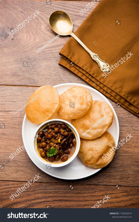 chole puri chana masala fried poori stock photo  shutterstock