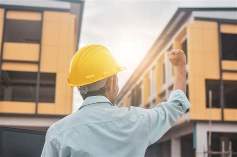 premium photo rear view  man working