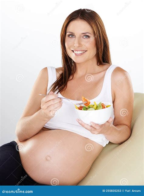 Healthy for Baby, Healthy for Me. a Pregnant Woman Eating a Healthy