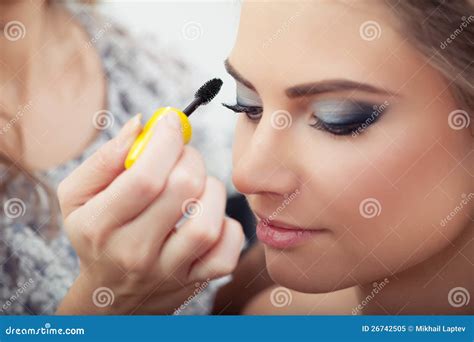 Applying mascara stock image. Image of elegance, face - 26742505