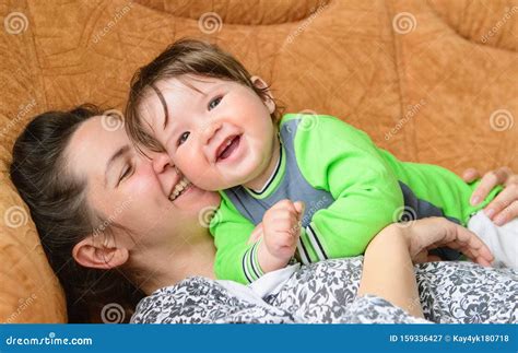 Baby with Mother Laugh. Real Emotions. Happy Family. Baby and Mother ...