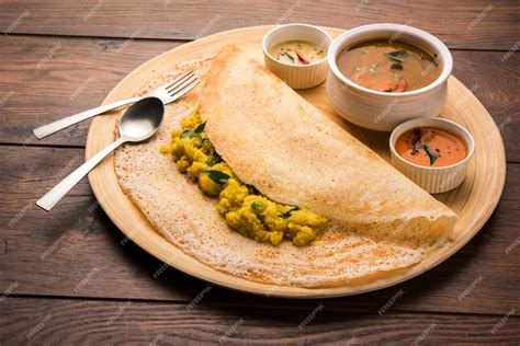 masala dosa   south indian meal served  sambhar  coconut