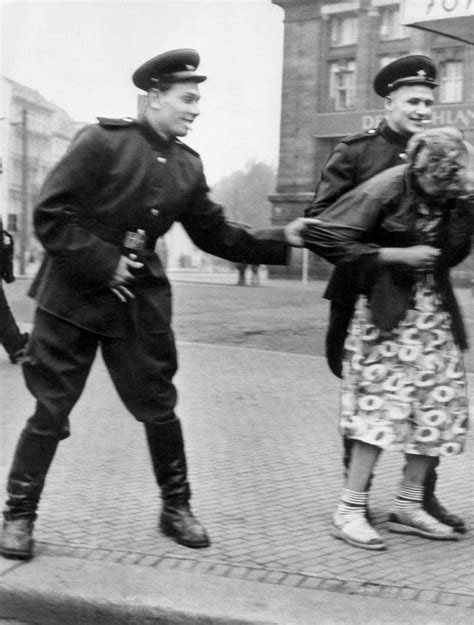 Soviet Soldiers Openly Sexually Harass a German Woman in Leipzig, 1945