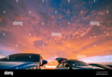 Car parked at outdoor car parking lot of campsite with beautiful sunset ...