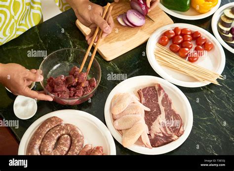 people preparing dinner stock photo alamy